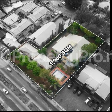 Land for rent Directly Facing Mega Chicken Elf Bustop Lekki Phase 1 Lekki Lagos