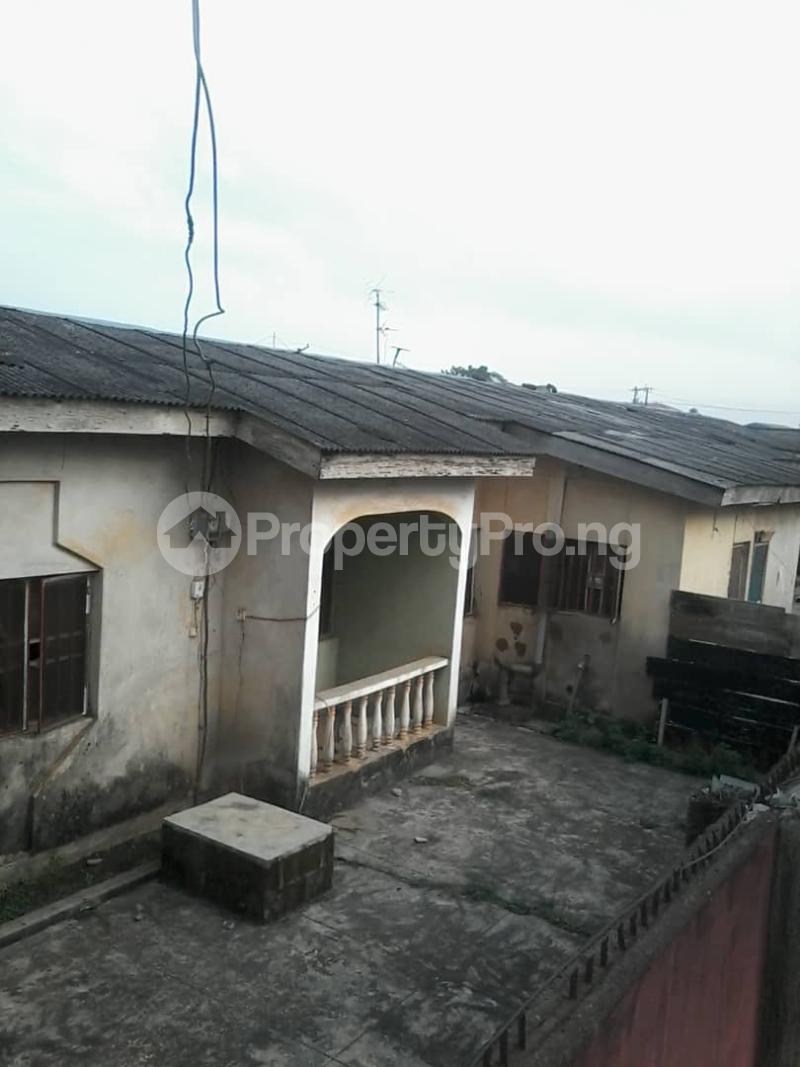 Land for sale On The Main Tarred Road Ayobo Ipaja Lagos