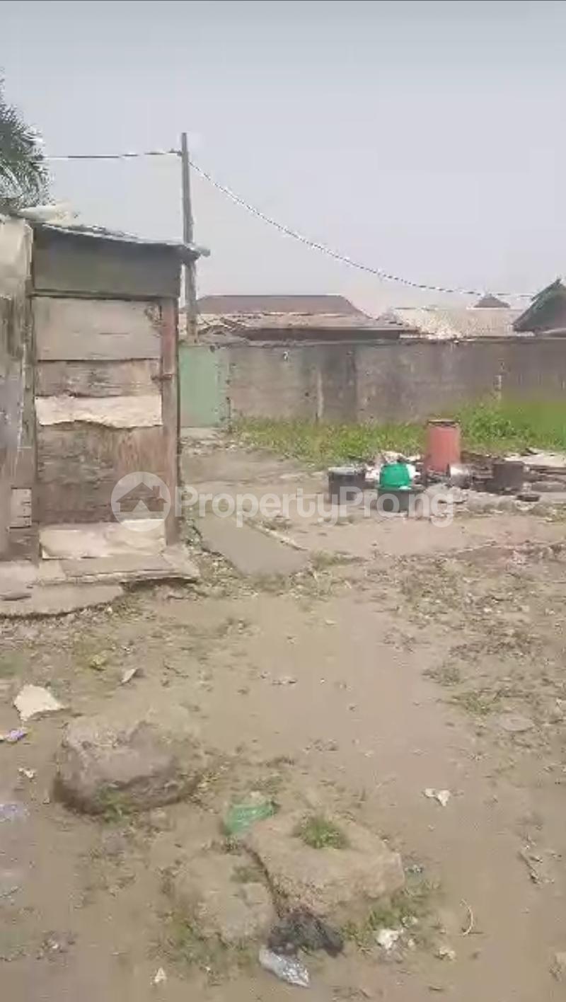 Land for rent Directly Facing Ago Palace Road Ago palace Okota Lagos
