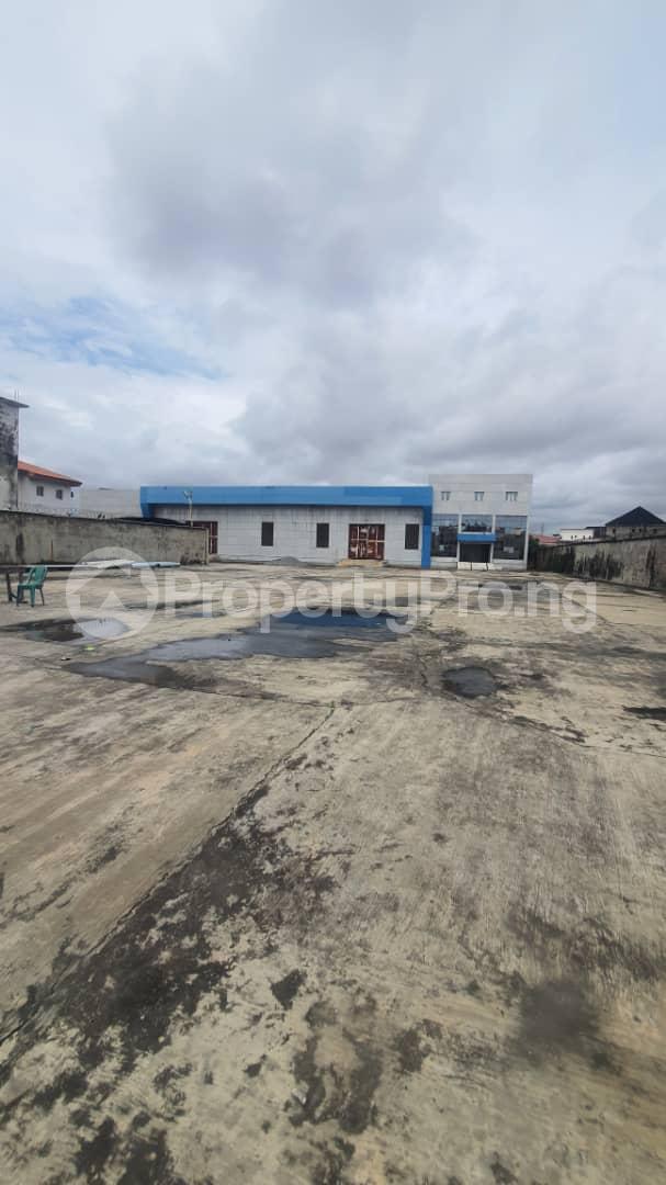 Land for sale Along Ago Palace Road Ago palace Okota Lagos