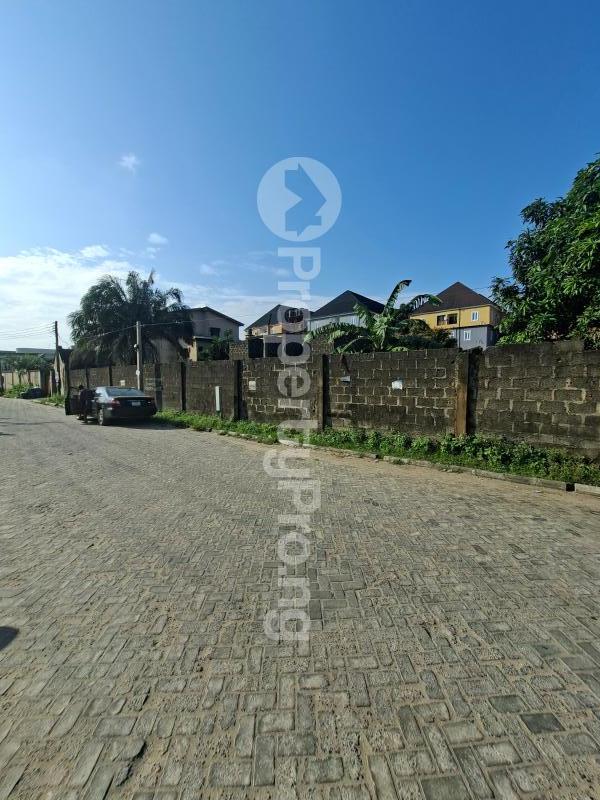 Land for sale Market Square Ago palace Okota Lagos
