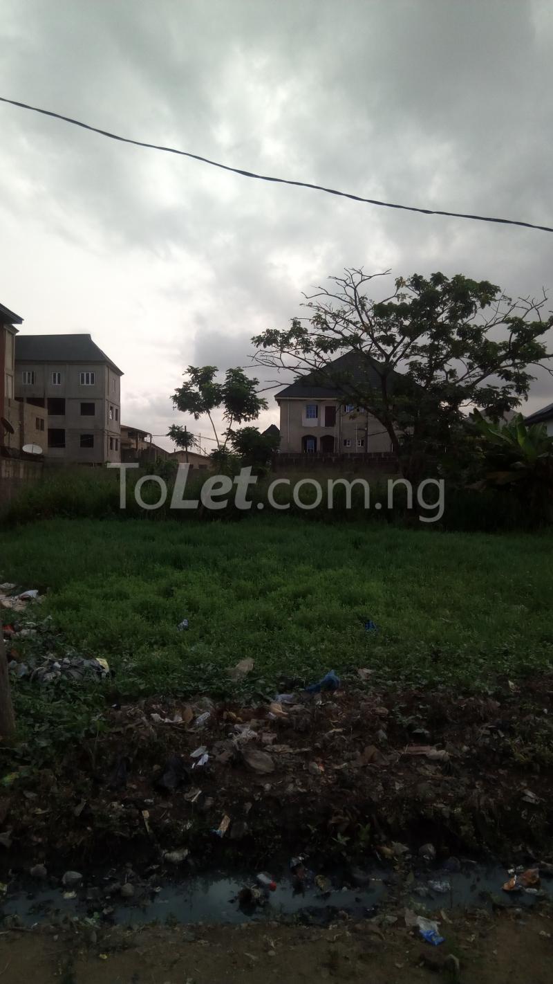 Land for sale Off Community Road Ago palace Okota Lagos