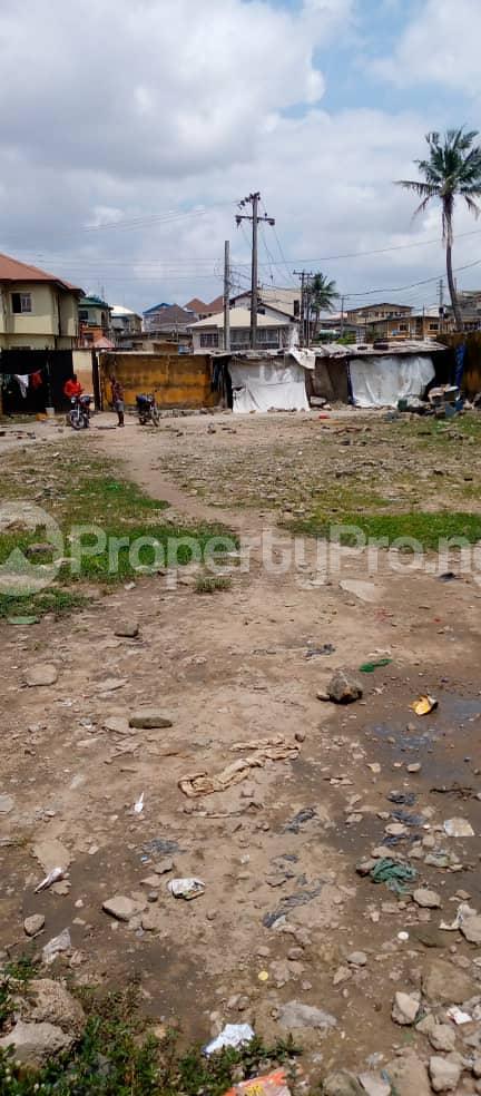 Land for sale Unity Estate Shogunle Oshodi Lagos