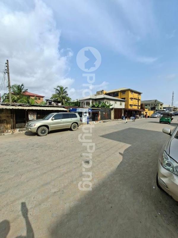 Land for sale Marcity Bus Stop Ago palace Okota Lagos