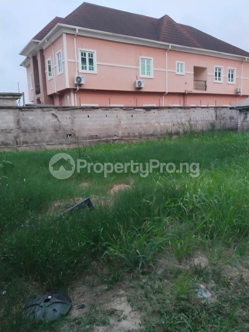 Land for sale Green Field Estate Ago palace Okota Lagos
