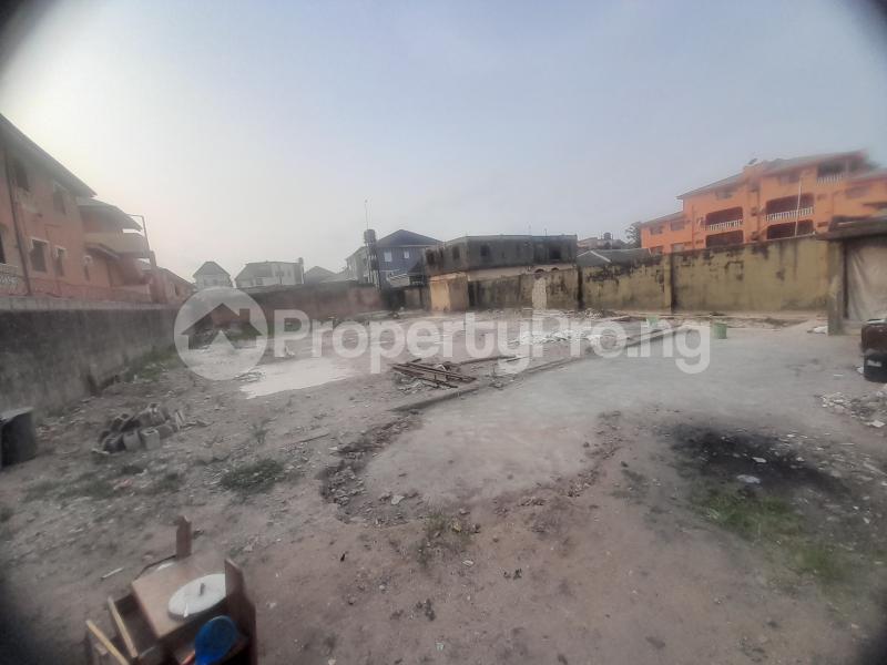 Land for sale Market Square, Peace Estate Ago palace Okota Lagos