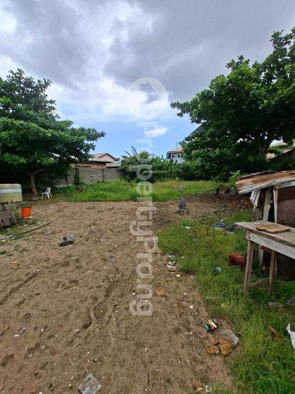 Land for sale Divine Estate Ago palace Okota Lagos