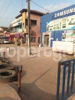 Commercial Property for sale Avenue Bustop Ago palace Okota Lagos
