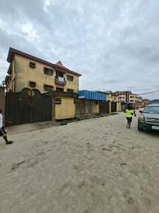 House for sale Market Square, Ago palace Okota Lagos