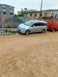 Land for sale Adedeji Street, Off Afariogun Str Oshodi Lagos
